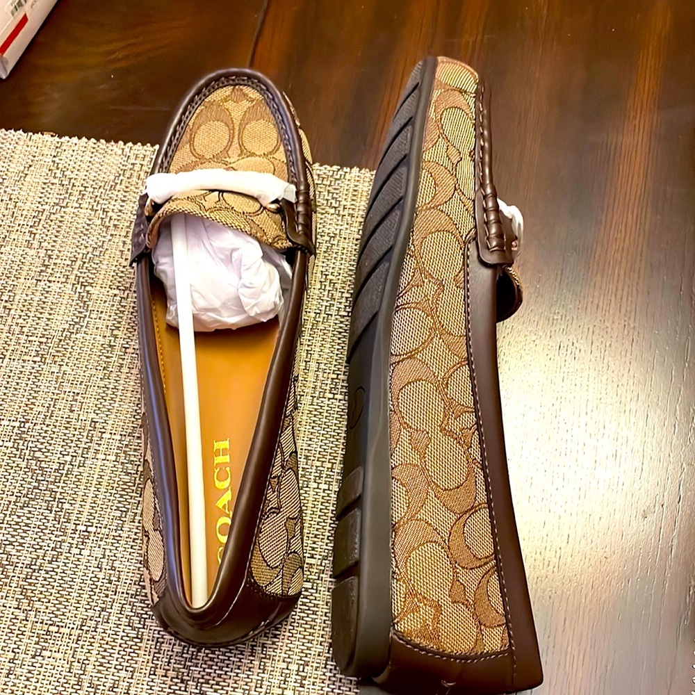 Coach loafers!  Cute, comfortable and simple.